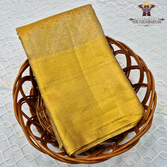 A rich bright golden shade that radiates a luxurious and traditional look Saree