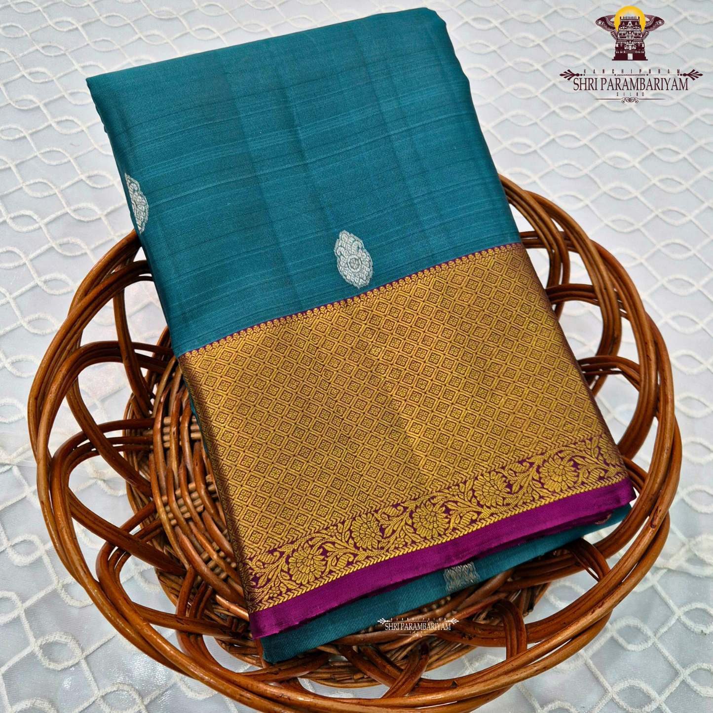 Teal blue (a rich greenish-blue shade) Saree