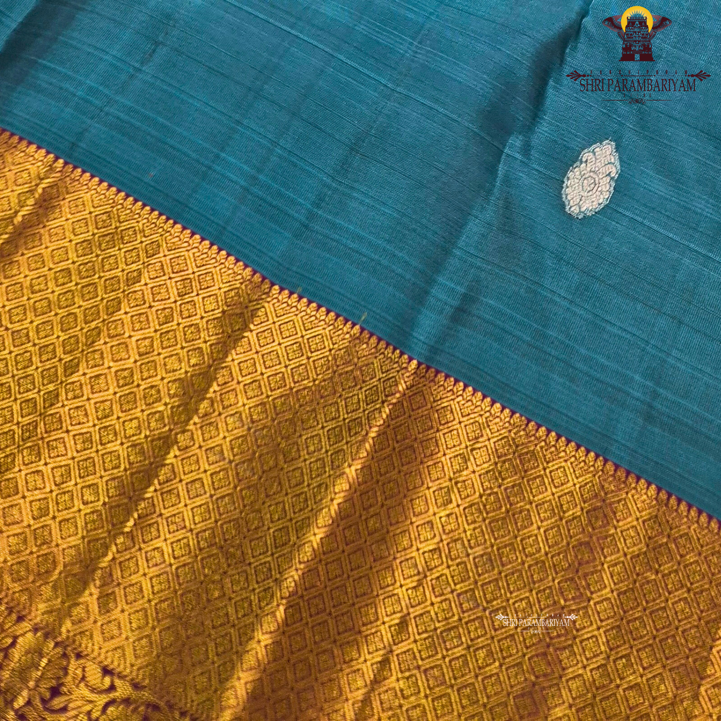 Teal blue (a rich greenish-blue shade) Saree