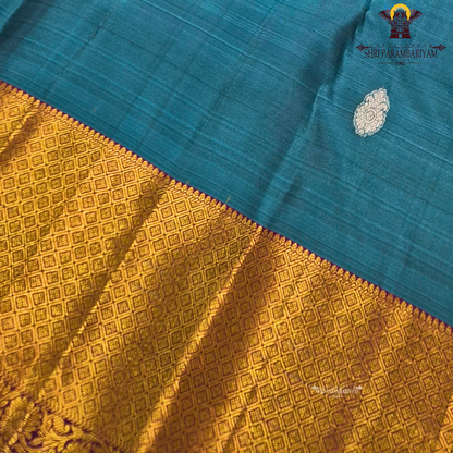 Teal blue (a rich greenish-blue shade) Saree