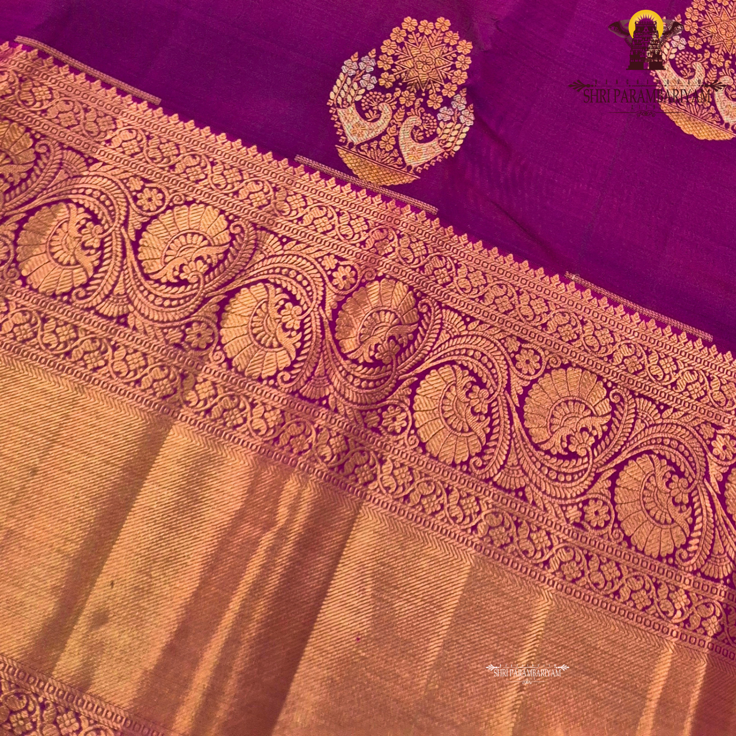 Vibrant magenta pink with rich gold zari and meenakari Saree