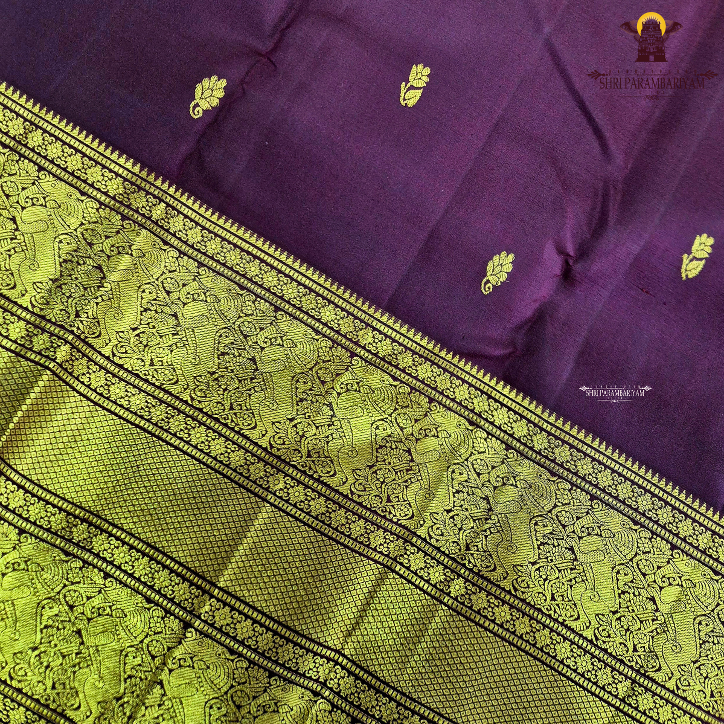 An elegant Deep Wine Maroon shade, beautifully enhanced with delicate gold zari Saree