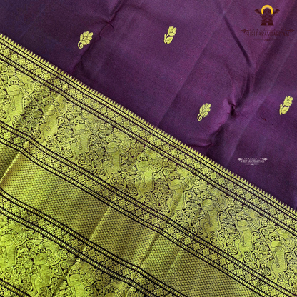 An elegant Deep Wine Maroon shade, beautifully enhanced with delicate gold zari Saree