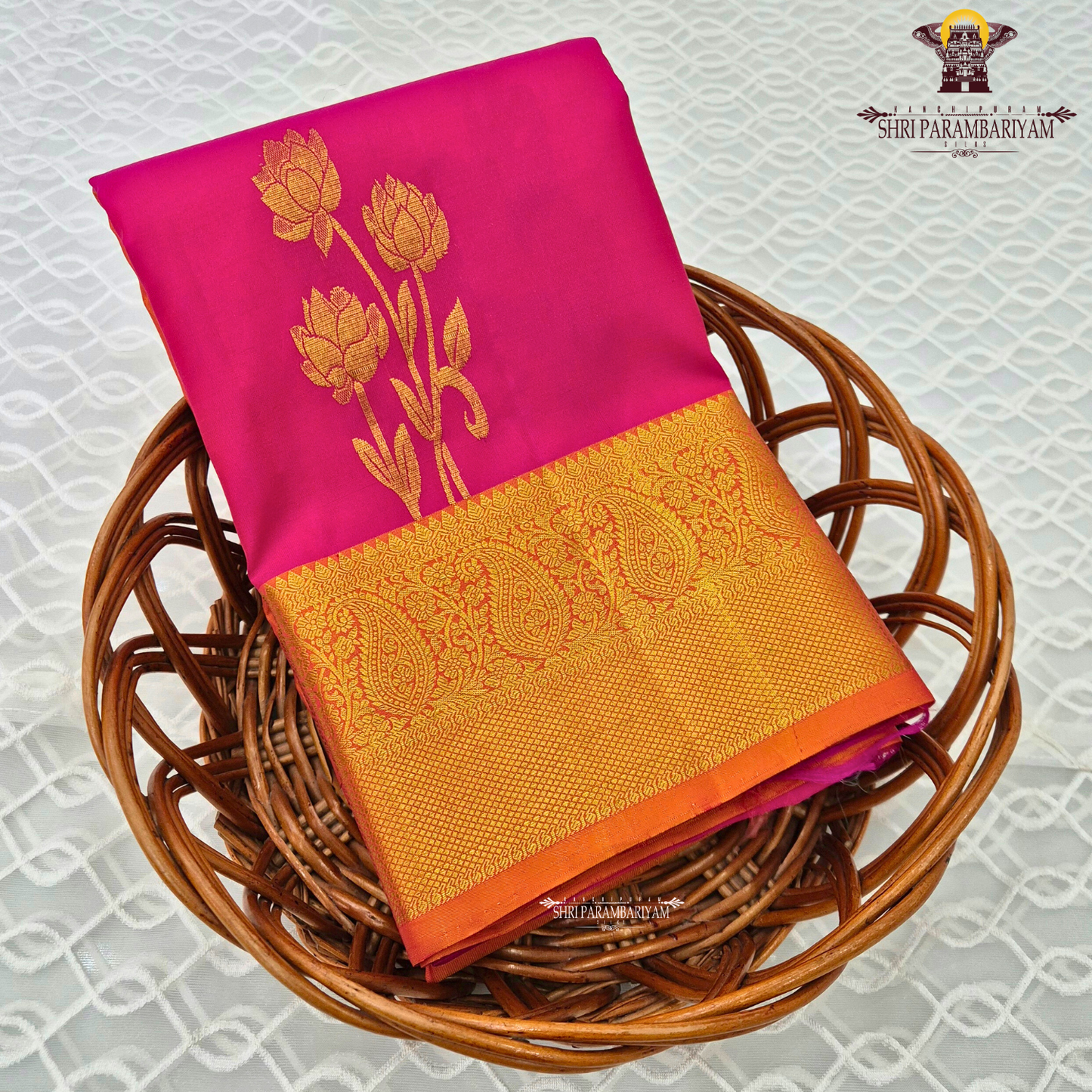 A vibrant rani pink body that radiates richness and elegance Saree