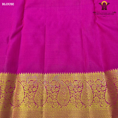 A vibrant rani pink body that radiates richness and elegance Saree