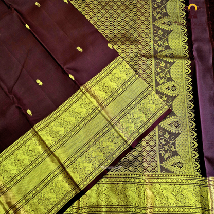 An elegant Deep Wine Maroon shade, beautifully enhanced with delicate gold zari Saree