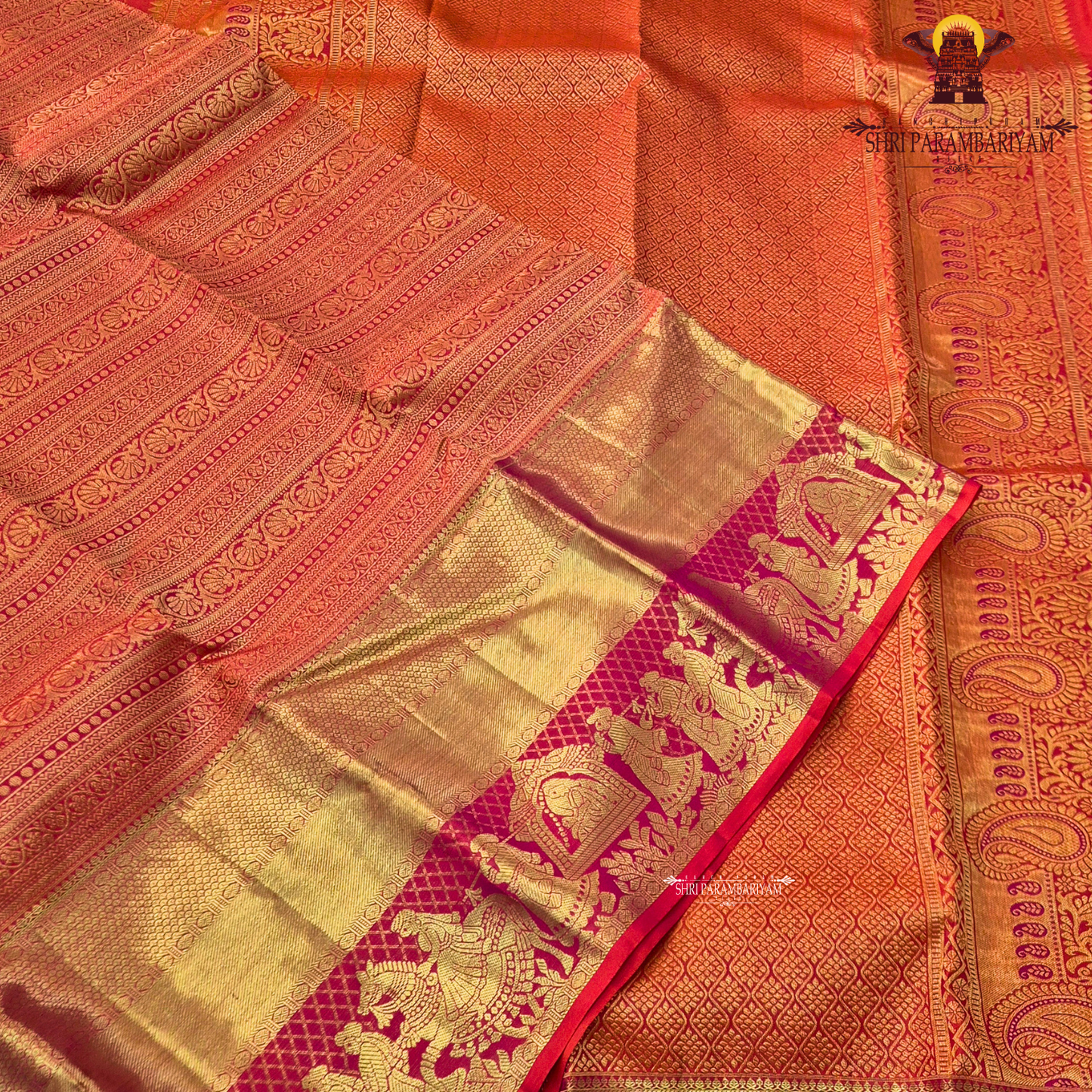 A vibrant bridal red color paired with rich gold zari weaving Saree