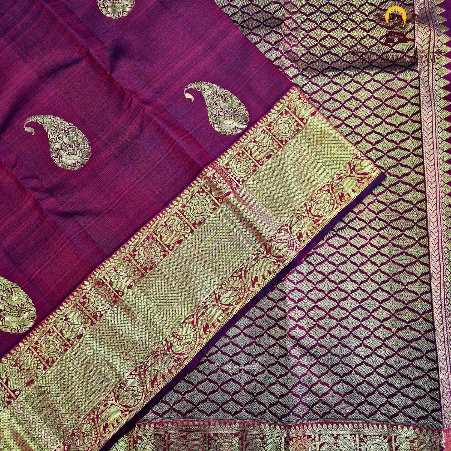 A rich maroon red Saree