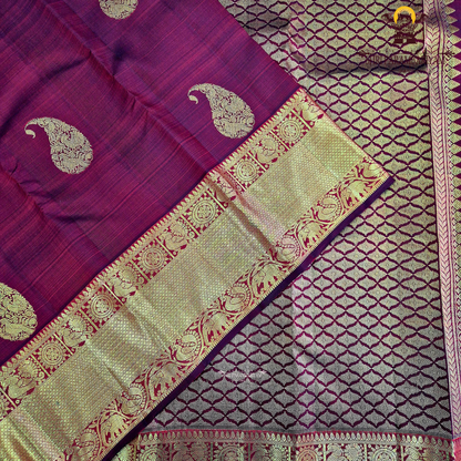 A rich maroon red Saree