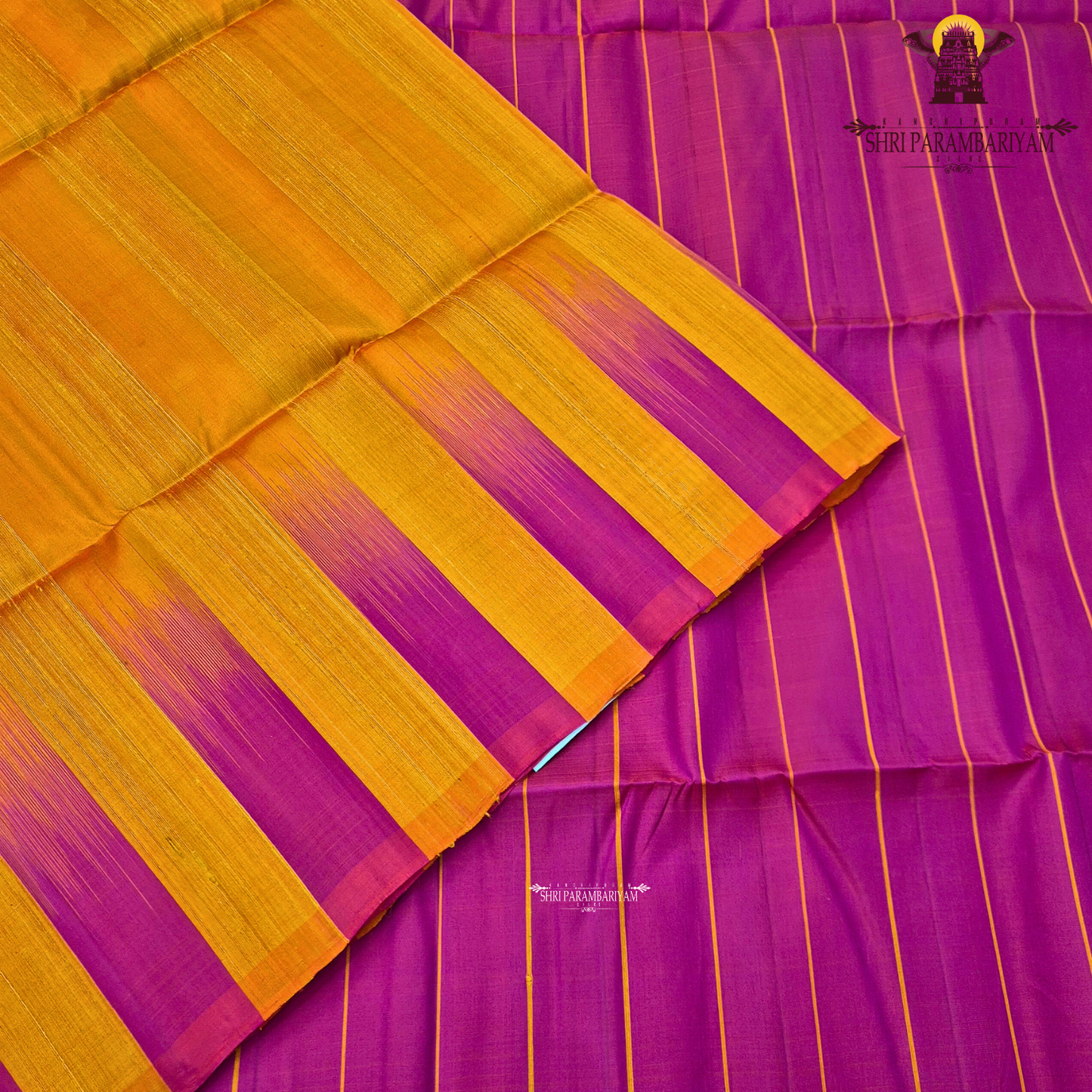 A striking dual-tone combination of vibrant rani pink and rich mustard orange Saree