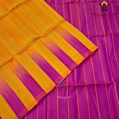 A striking dual-tone combination of vibrant rani pink and rich mustard orange Saree