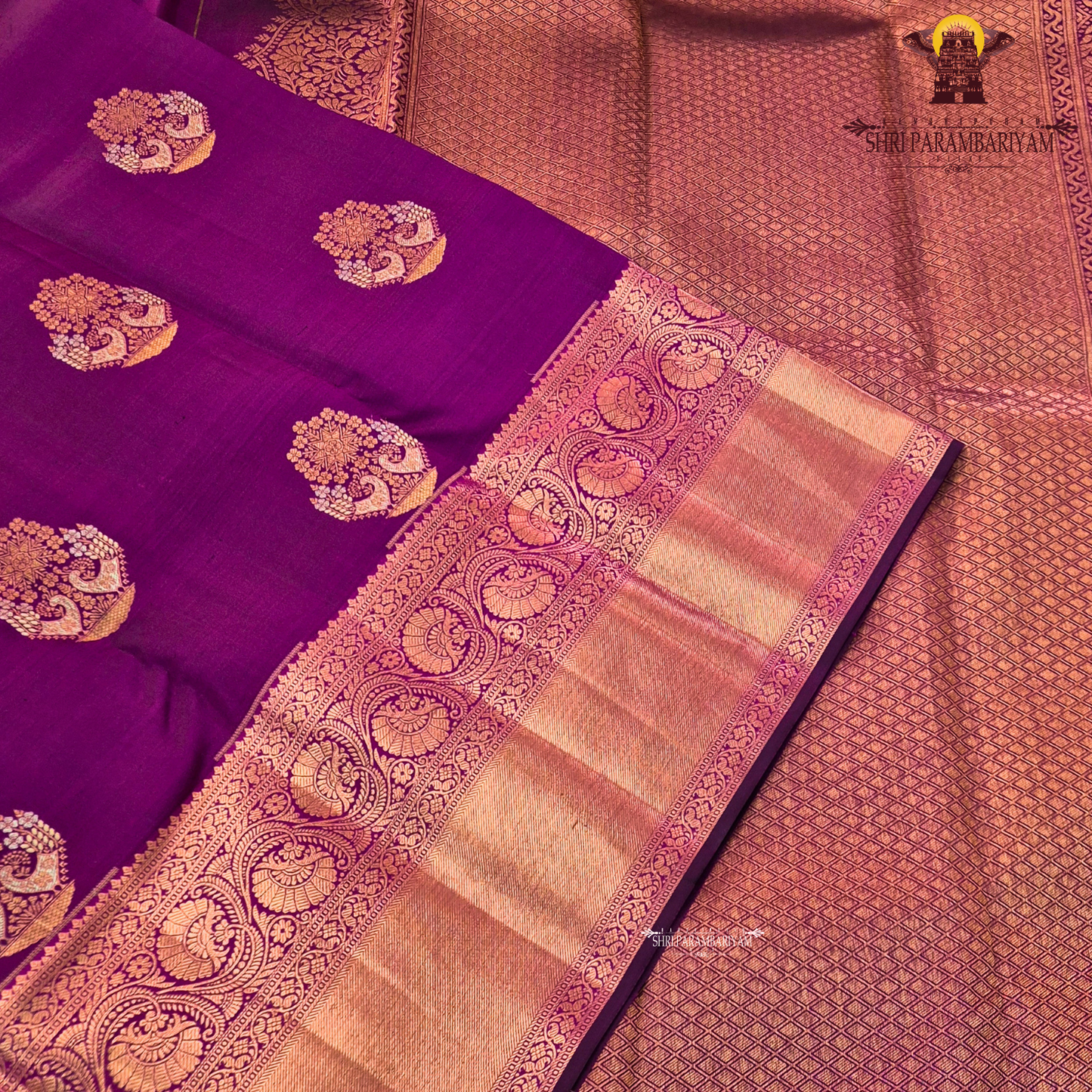 Vibrant magenta pink with rich gold zari and meenakari Saree