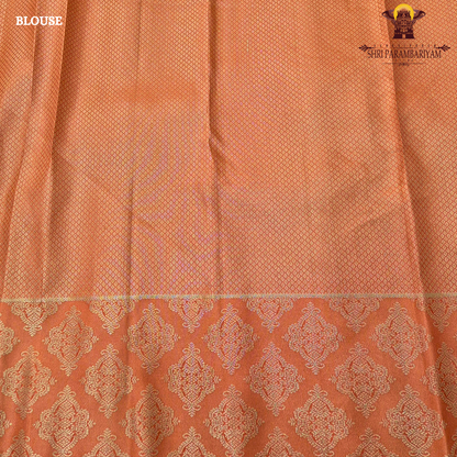 Mustard yellow body with coral pink / peach contrast pallu and elegant silver zari work Saree