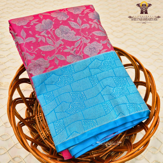 Bright rani pink body with sky blue contrast border/pallu and silver zari Saree