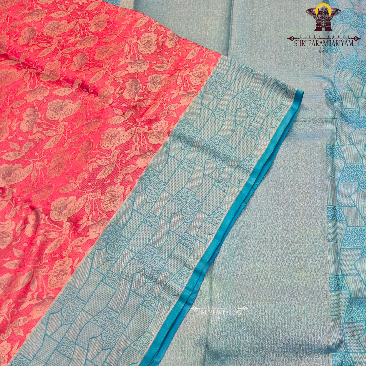 Bright rani pink body with sky blue contrast border/pallu and silver zari Saree