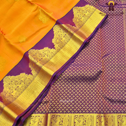 Radiant sunset orange with Deep royal plum purple with opulent antique gold zari Saree