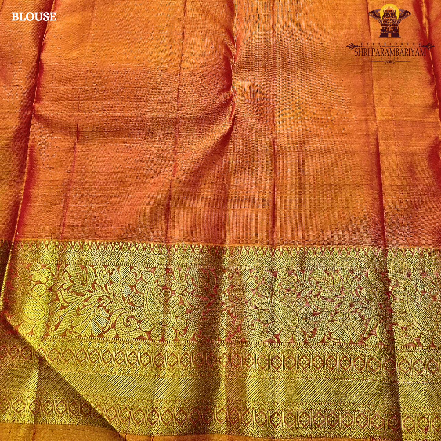 Bright rani pink (vibrant magenta tone) with a rich gold zari border and orange edging Saree