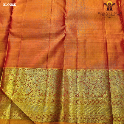 Bright rani pink (vibrant magenta tone) with a rich gold zari border and orange edging Saree