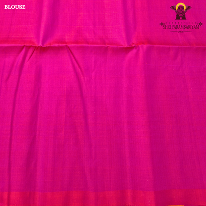A striking dual-tone combination of vibrant rani pink and rich mustard orange Saree