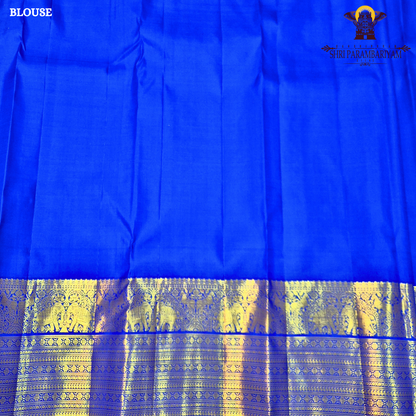 A vibrant Royal Blue with Antique Gold Zari Saree