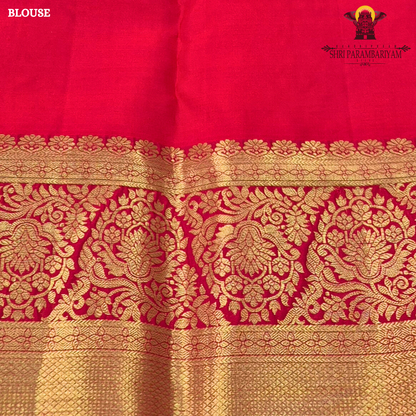 Soft cream/ivory body paired with a striking deep red border Saree