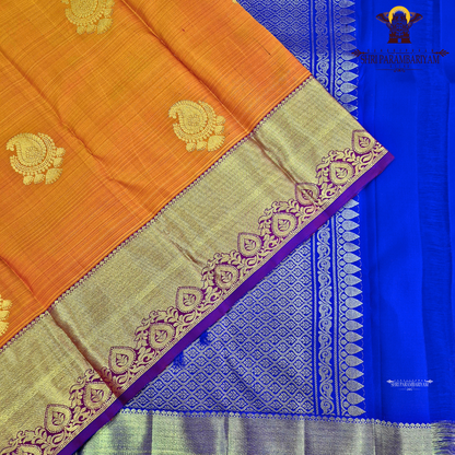A rich Bright mango orange body with a rich gold zari Saree