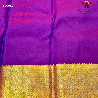 Elegant teal blue body with rich royal purple contrast pallu and antique gold zari Saree