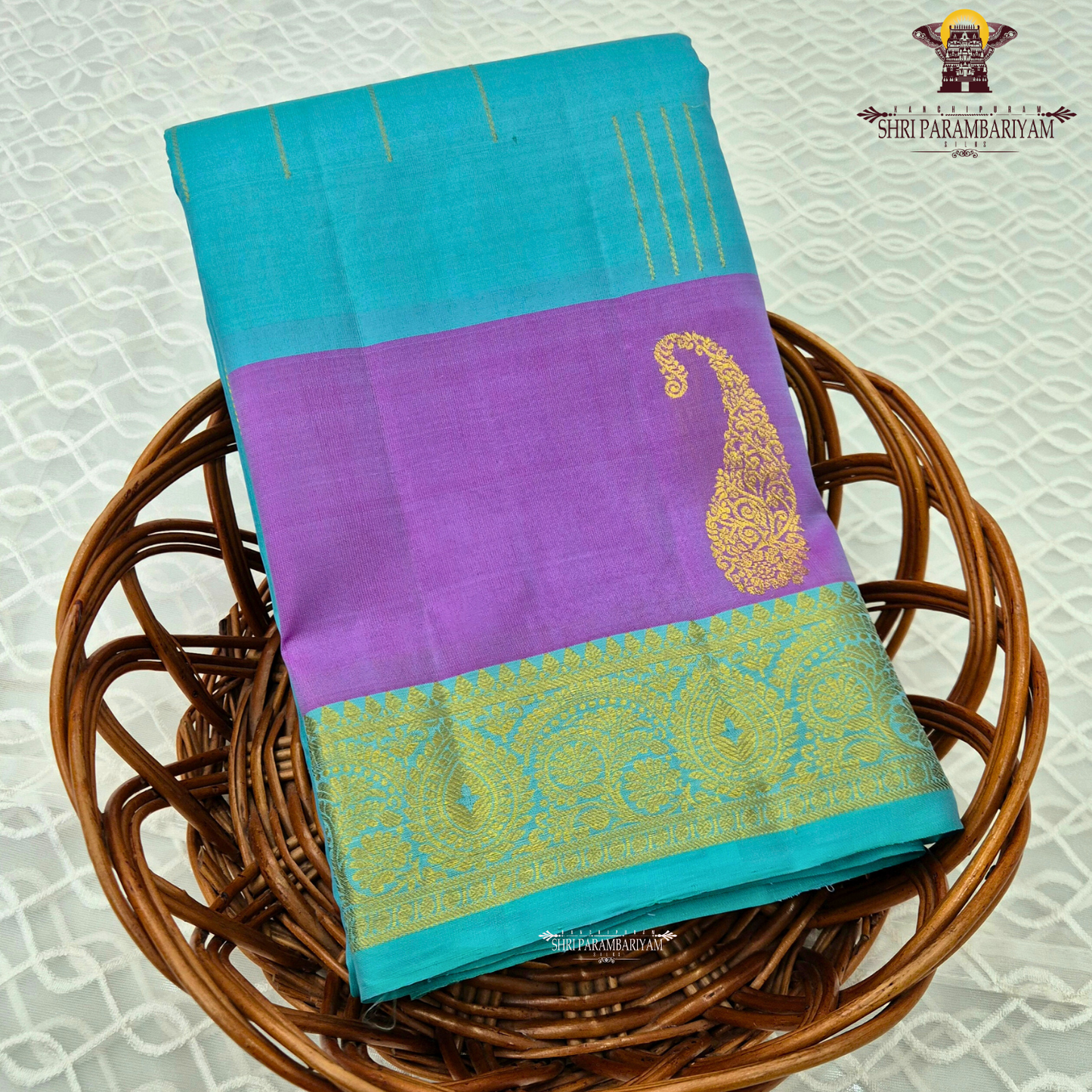 Dual-tone Aqua Blue and Lavender (Violet) with a matching Aqua border Saree