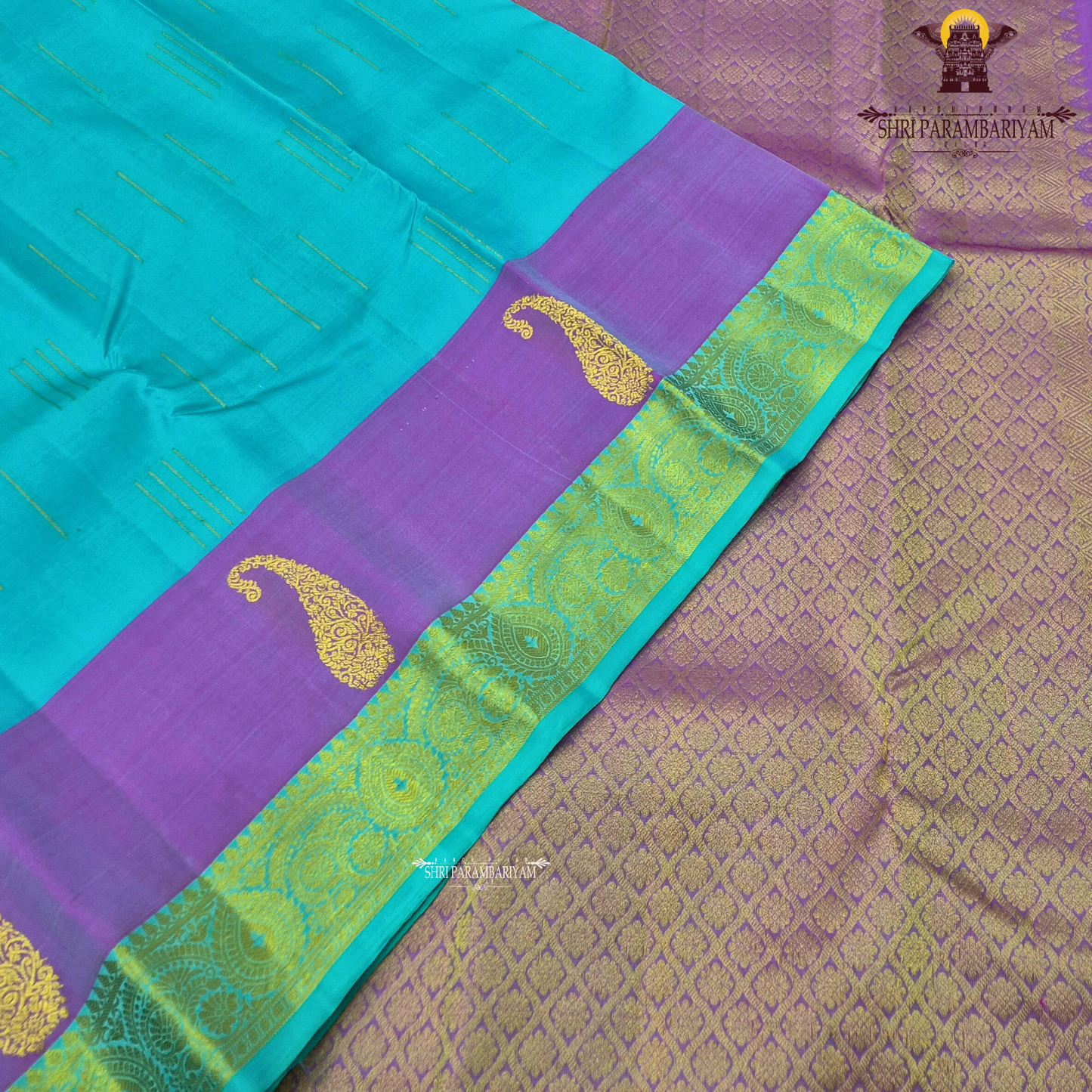 Dual-tone Aqua Blue and Lavender (Violet) with a matching Aqua border Saree