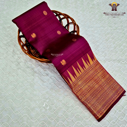 A deep Wine Purple (rich wine with a magenta undertone) Saree