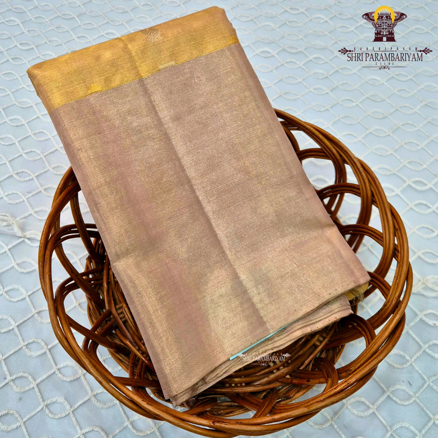 A delicate champagne gold with a subtle rose-gold tint Saree