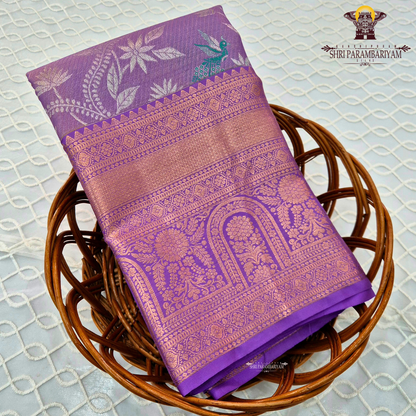Soft lavender purple with rich gold zari and meenakari accents Saree