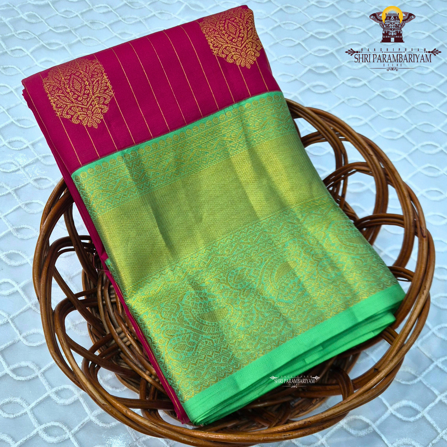 A beautiful rani pink and parrot green combination Saree