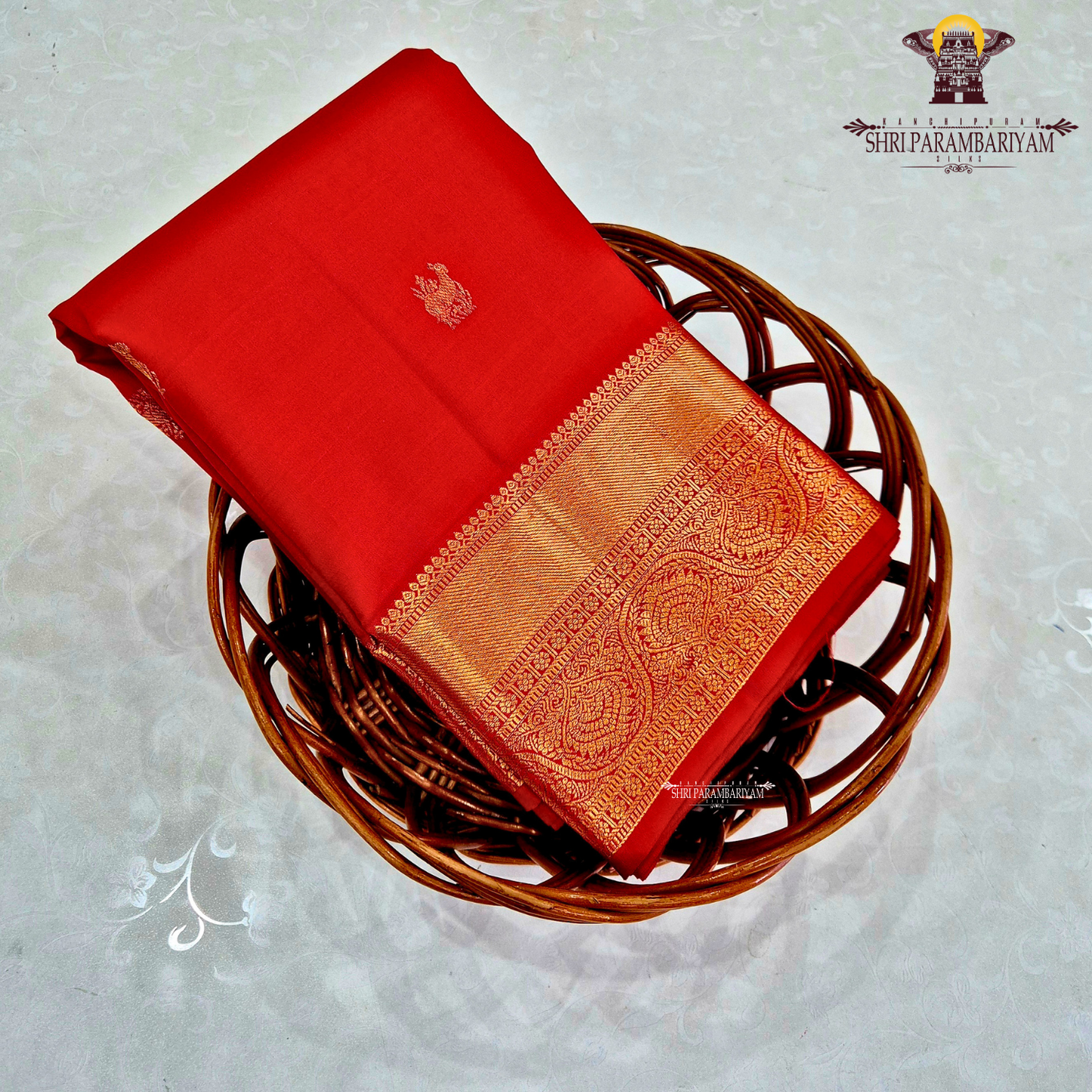 A rich bright vermilion red Saree