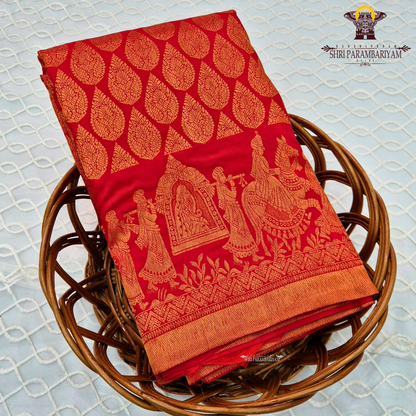 A vibrant bridal red color beautifully enhanced with rich gold zari weaving Saree