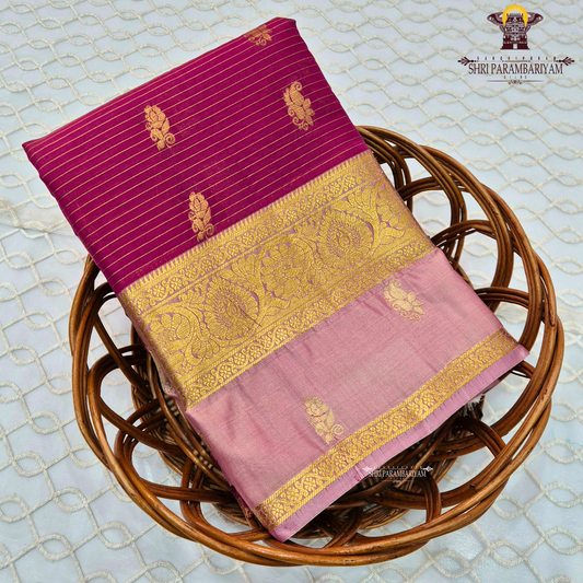 Rich magenta pink body with light pastel pink contrast pallu and antique gold zari Saree