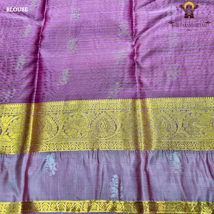 Rich magenta pink body with light pastel pink contrast pallu and antique gold zari Saree