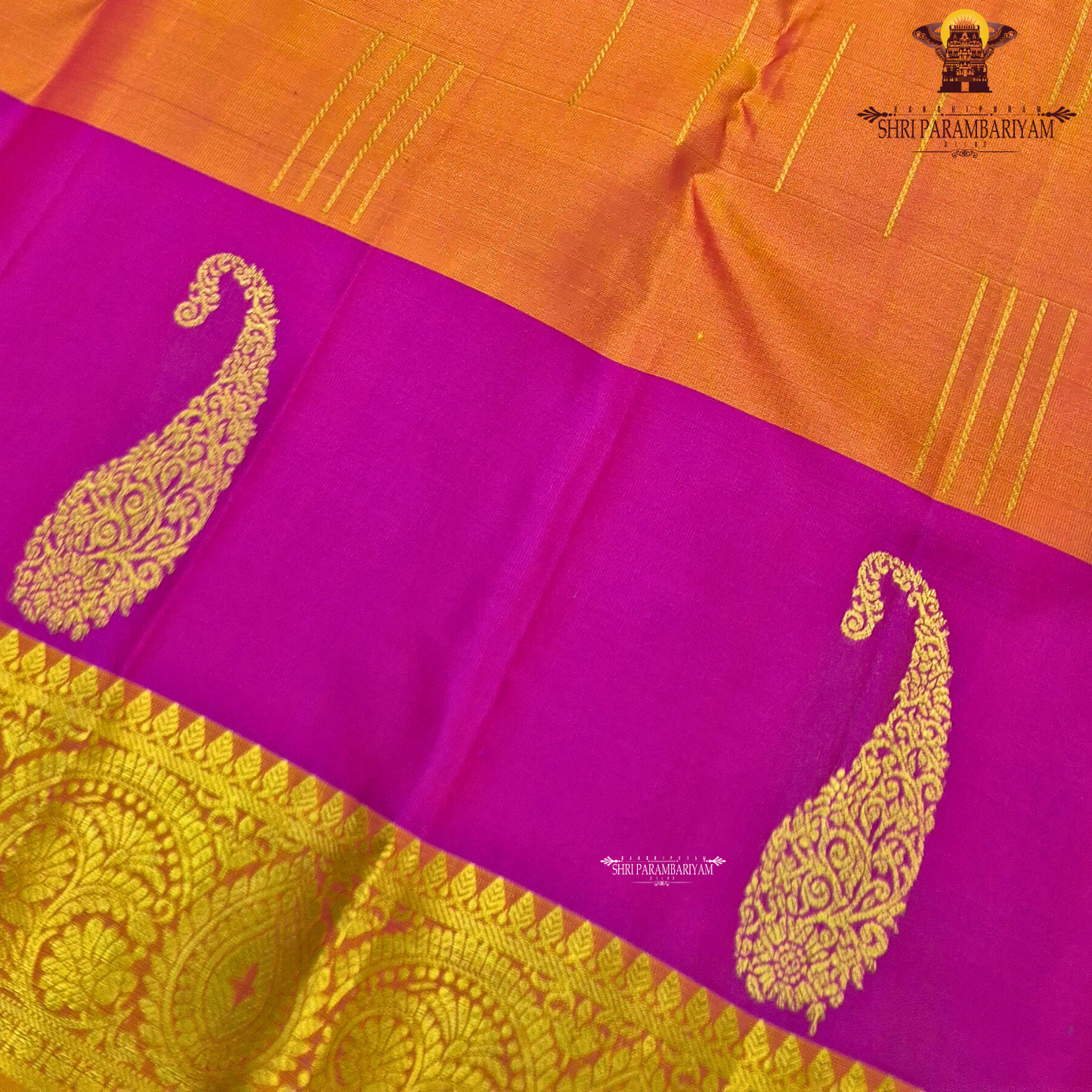 Vibrant rani pink and rich turmeric orange, beautifully enhanced Saree