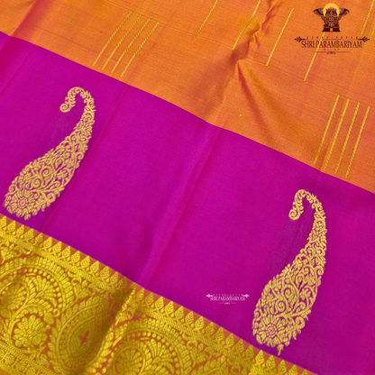 Vibrant rani pink and rich turmeric orange, beautifully enhanced Saree