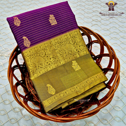 Royal purple body with olive green contrast pallu and rich antique gold zari Saree