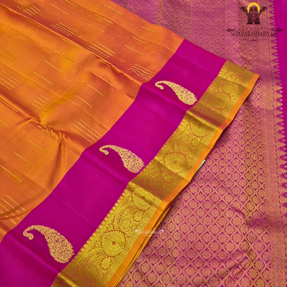 Vibrant rani pink and rich turmeric orange, beautifully enhanced Saree
