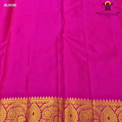 Vibrant rani pink and rich turmeric orange, beautifully enhanced Saree