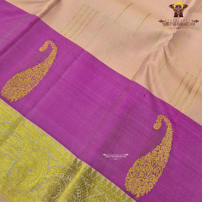 A graceful combination of soft peach and vibrant rani pink, enriched with elegant Saree