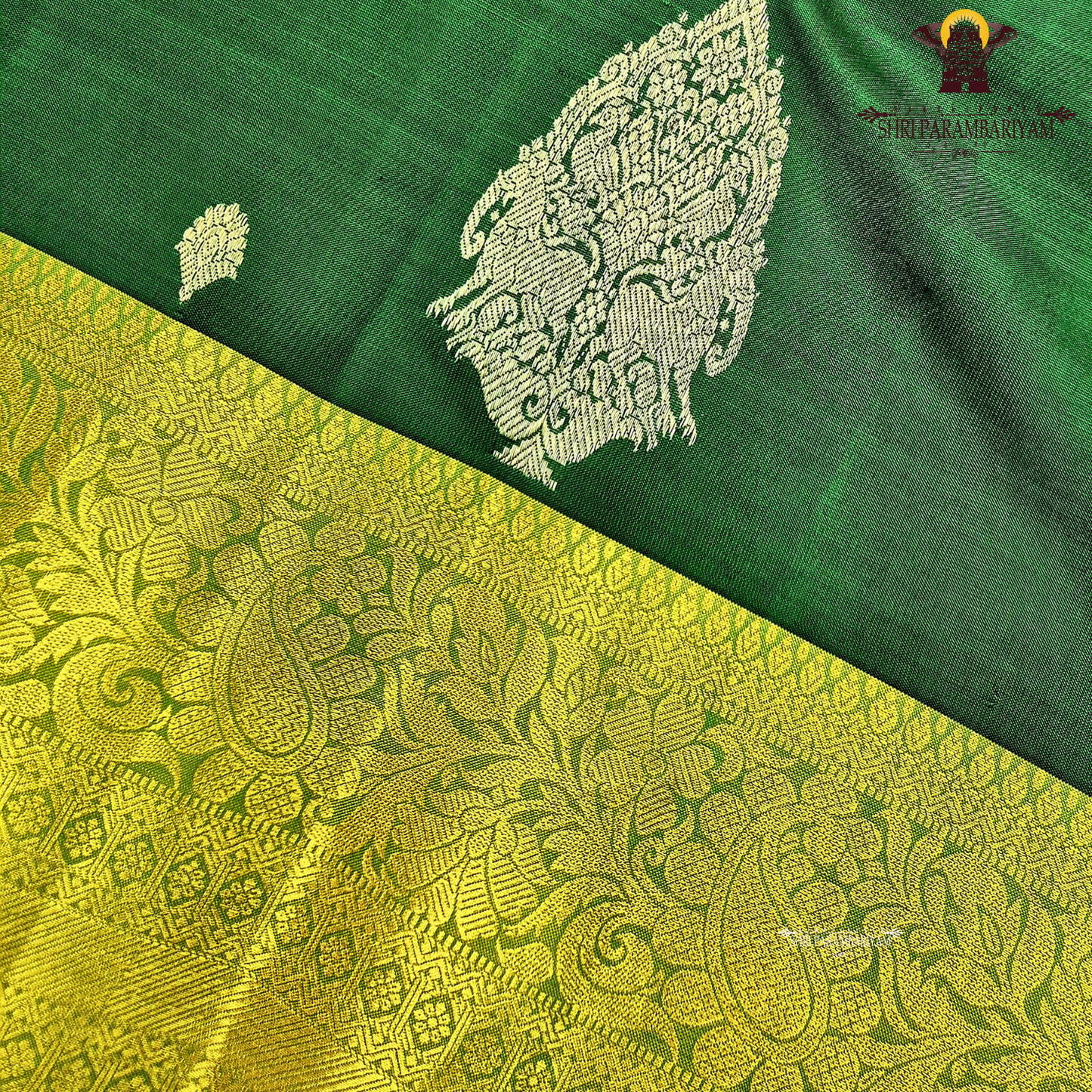Rich bottle green with a contrasting antique gold zari border featuring a subtle olive-green tone Saree