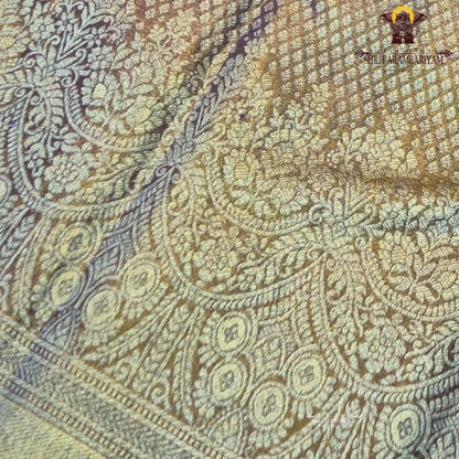 A rich Golden Tissue base with a soft Purple (Violet) border Saree