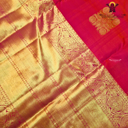 A rich Rani pink / Tomato Red with Antique Gold Zari Saree