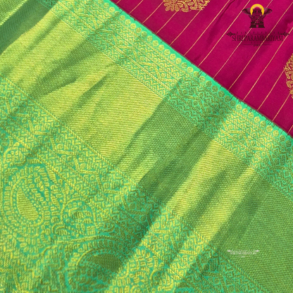 A beautiful rani pink and parrot green combination Saree