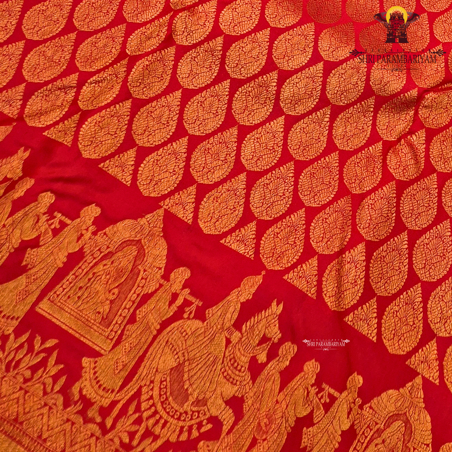 A vibrant bridal red color beautifully enhanced with rich gold zari weaving Saree