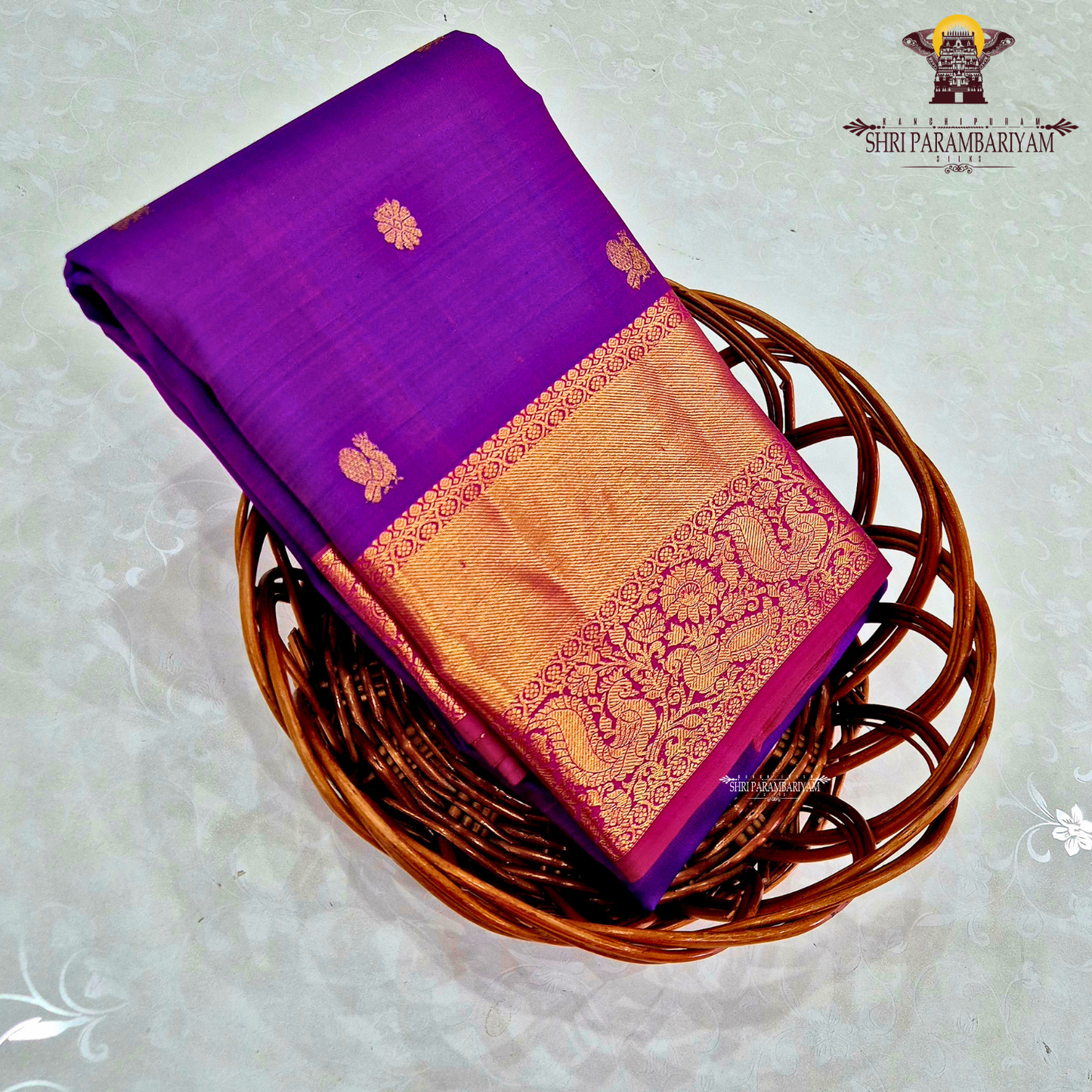 A rich Royal purple (violet) with a contrasting gold zari border Saree