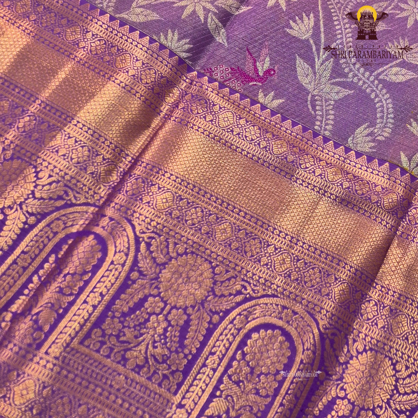 Soft lavender purple with rich gold zari and meenakari accents Saree